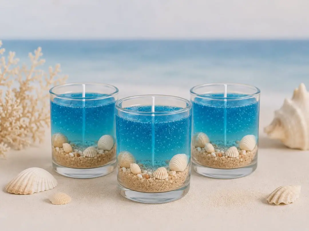 Coleção Ocean — velas gel azul com areia e conchas